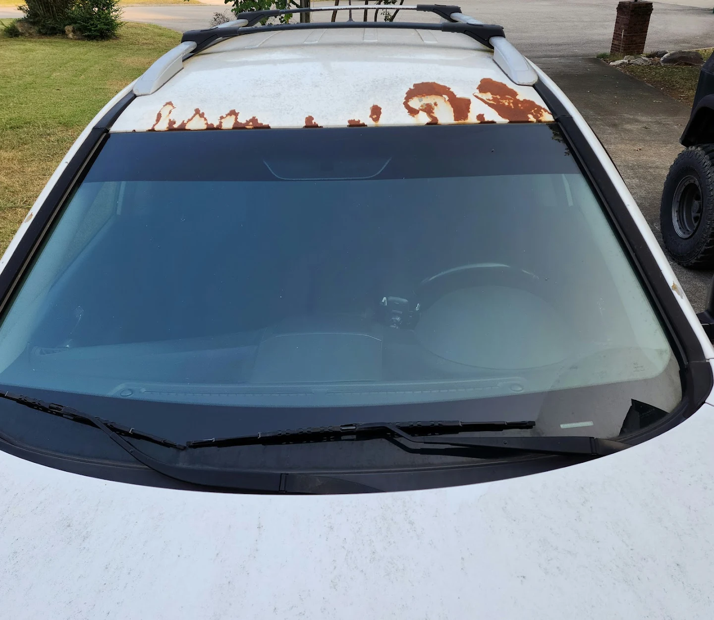 Before: Body repair and blended refinish completed at All Colors Body Shop