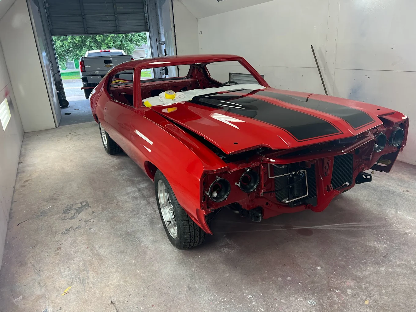 Auto body repair work completed in the All Colors Body Shop paint booth